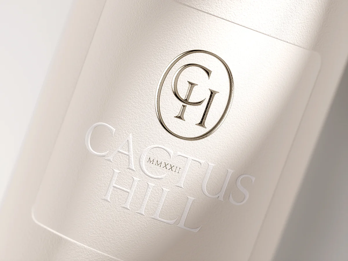 Label detail showing the "CH" monogram and "CACTUS HILL" text
