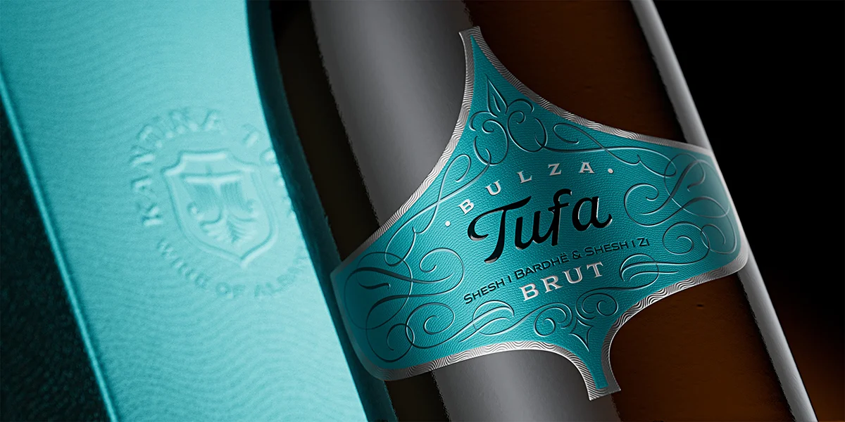 Micro-embossed shagreen texture and silver foil contouring detail on bespoke metallic substrate, Tufa Bulza sparkling wine label