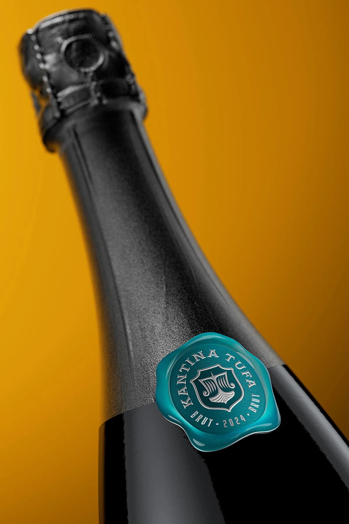 Teal wax-effect resin label badge on Tufa Bulza sparkling wine capsule, luxury wine branding detail, Kantina Tufa