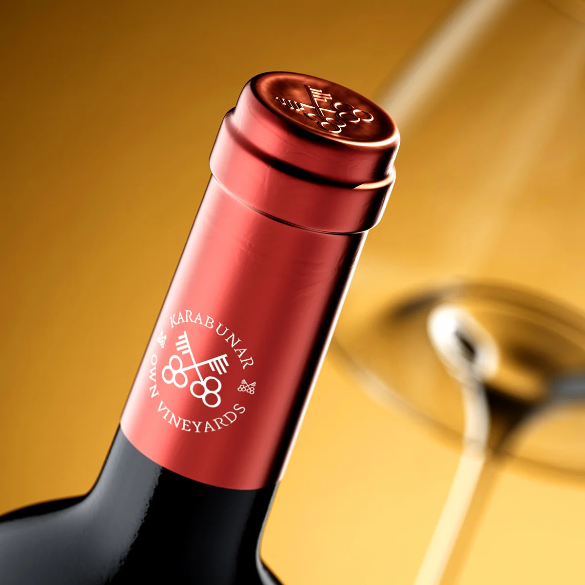 Via Vinera Special Selection capsule detail - semi-metallic burgundy capsule with embossed crossed keys logo and Karabunar Vineyards typography, premium heritage wine branding