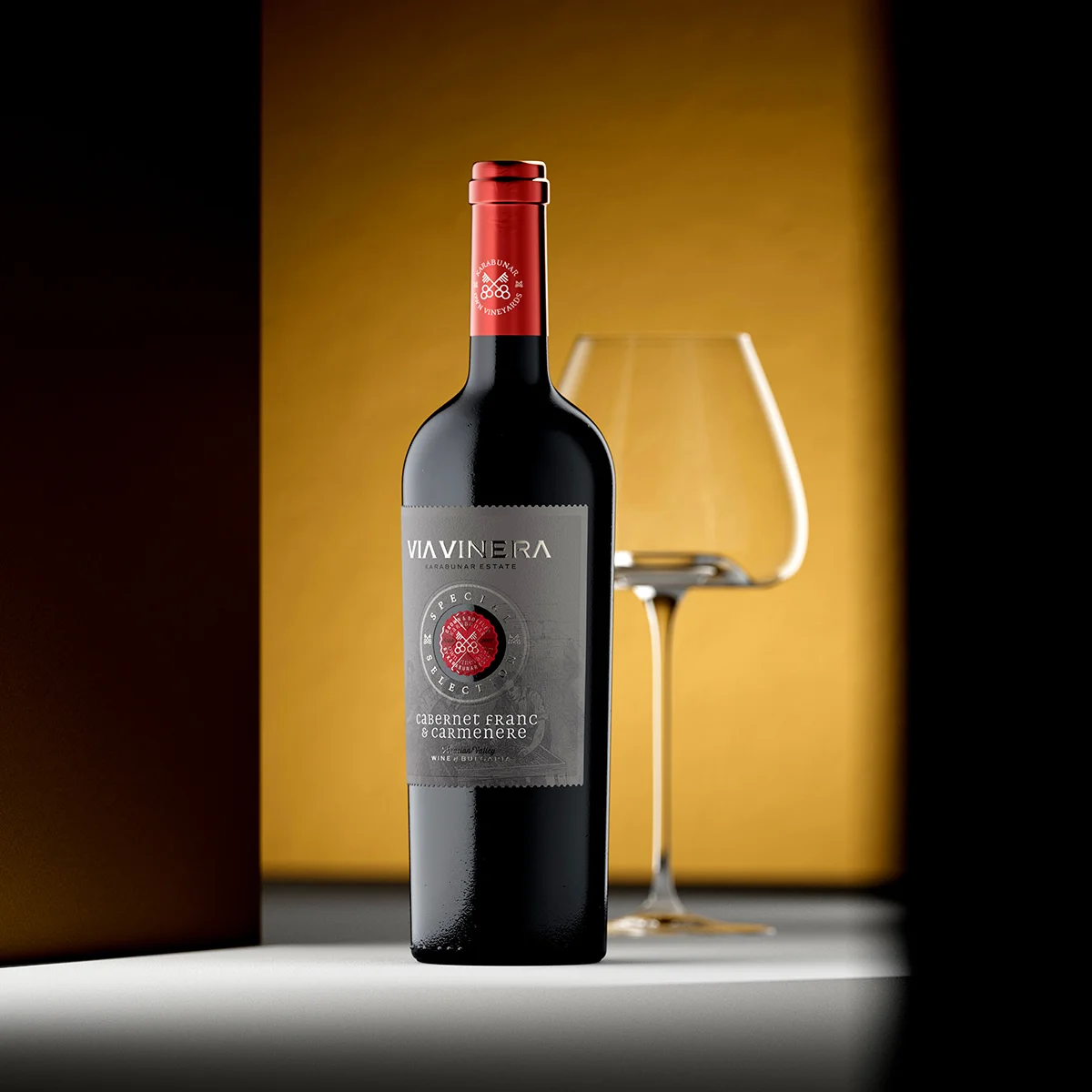 Via Vinera Special Selection Cabernet Franc and Carmenere - single bottle with wine glass, heritage wine label design on structured Cotton paper, Karabunar Estate Bulgaria