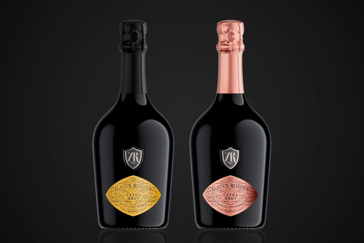Zlaten Rozhen sparkling wine label series: Blanc de Blancs with a yellow diamond label and black capsule beside the Rosé with a pink metallic label and pink capsule, both under a pewter ZR shield